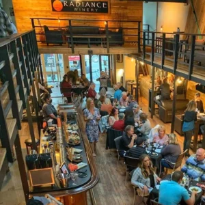 Crowded two story tasting room